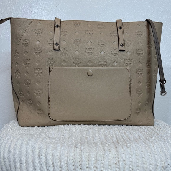 MCM Handbags - MCM Beige/Tan Logo Embossed Leather Tote